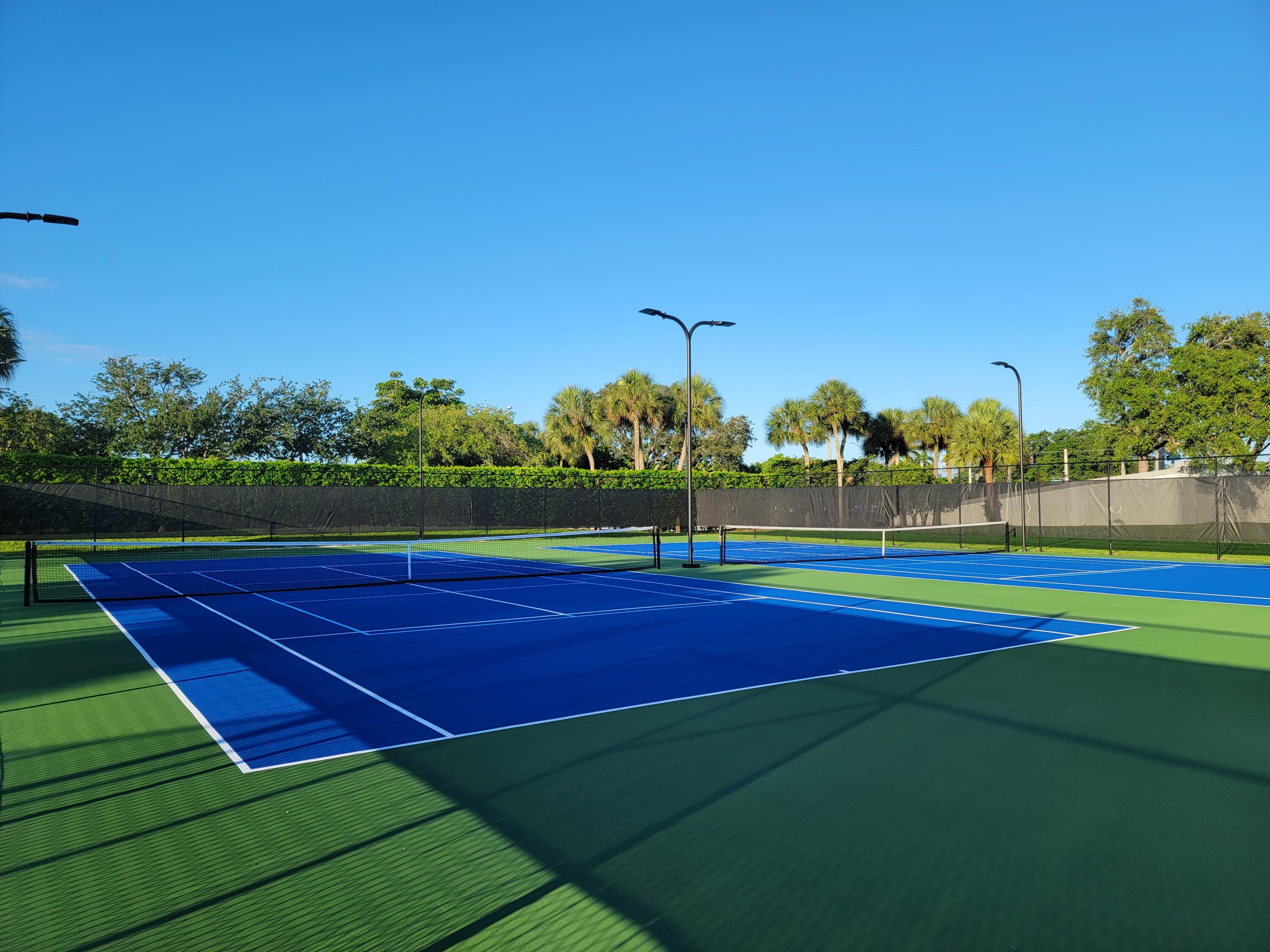 9682 Ohio Place Boca Raton, FL 33434 - Photo 36 of 37 a view of an outdoor space and tennis court