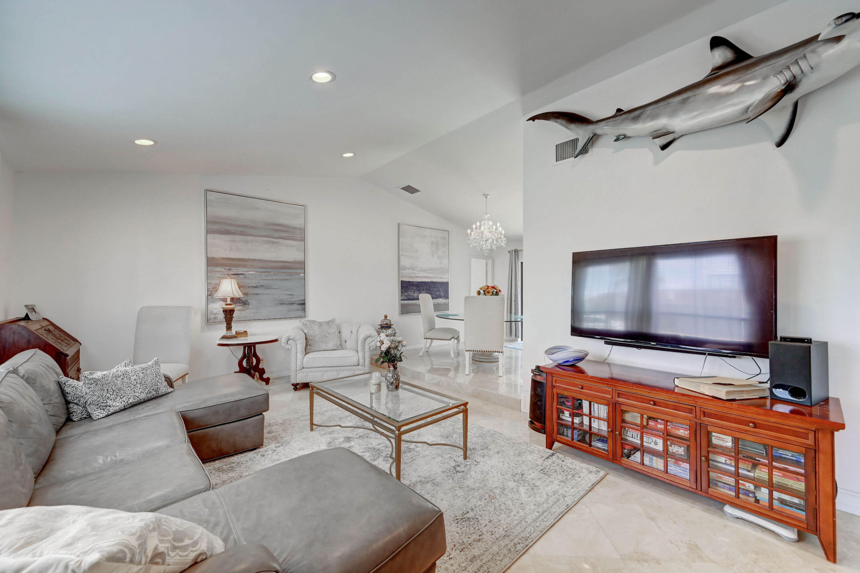 9682 Ohio Place Boca Raton, FL 33434 - Photo 7 of 37 a living room with furniture and a flat screen tv
