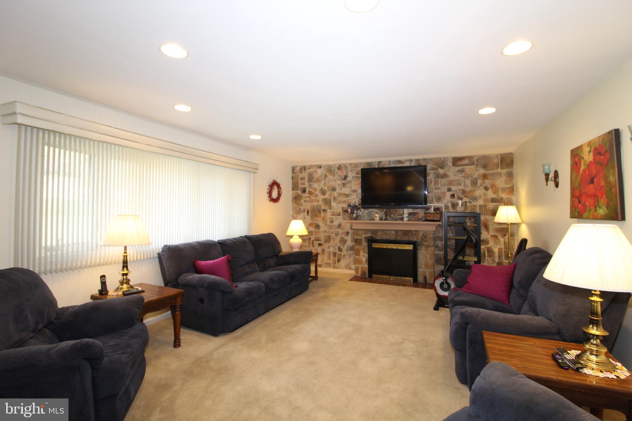 2511 North Gate Road Wilmington, DE 19810 - Photo 10 of 35 Family Room with Stone Fireplace