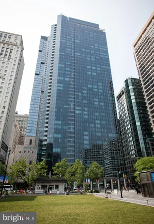 a tall building sitting on the side of a street