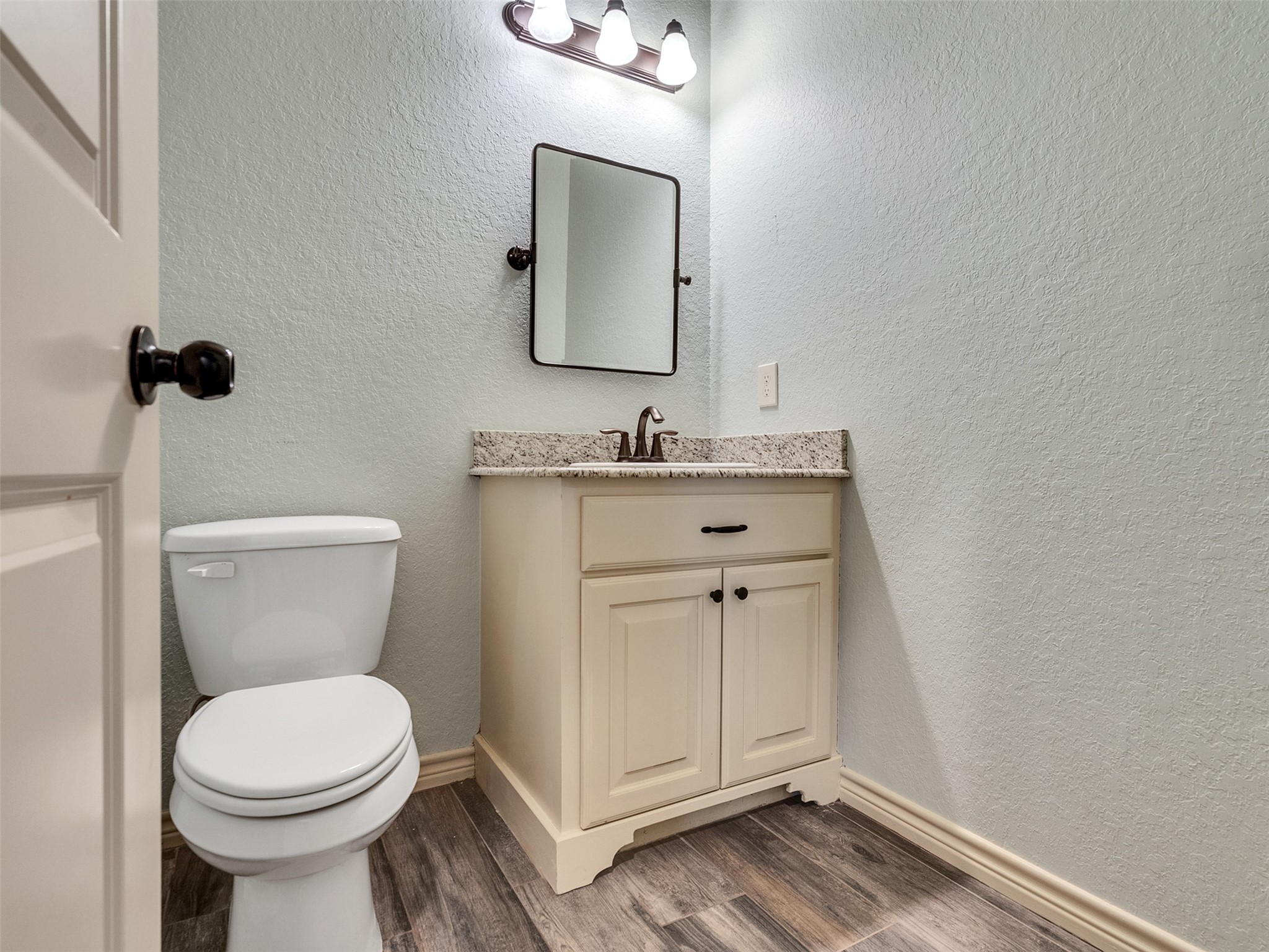 18005 Cindy Lane Conroe, TX 77302 - Photo 38 of 49 Powder room just off the kitchen and living room.