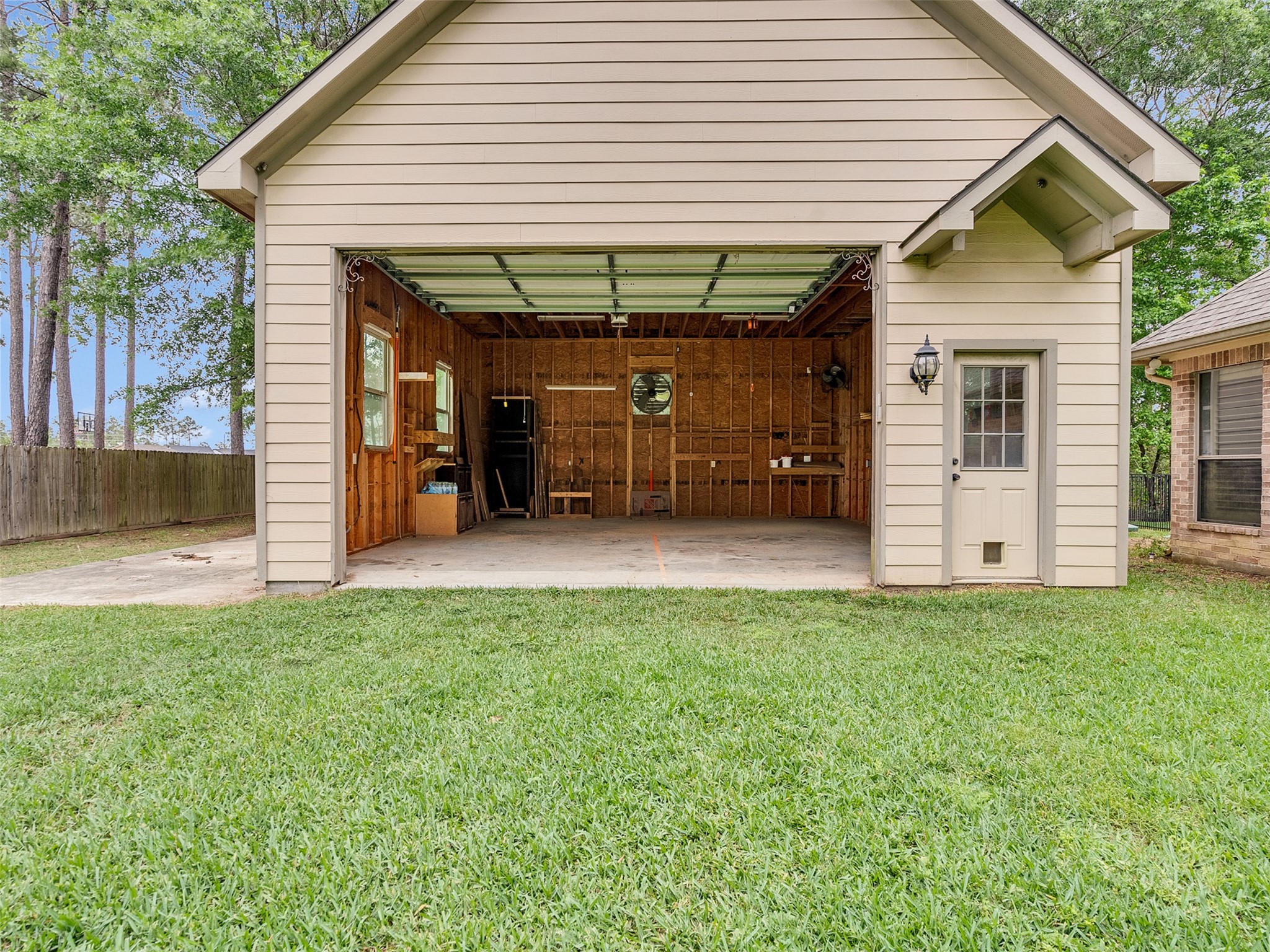 18005 Cindy Lane Conroe, TX 77302 - Photo 44 of 49 Workshop with a separate entry door.