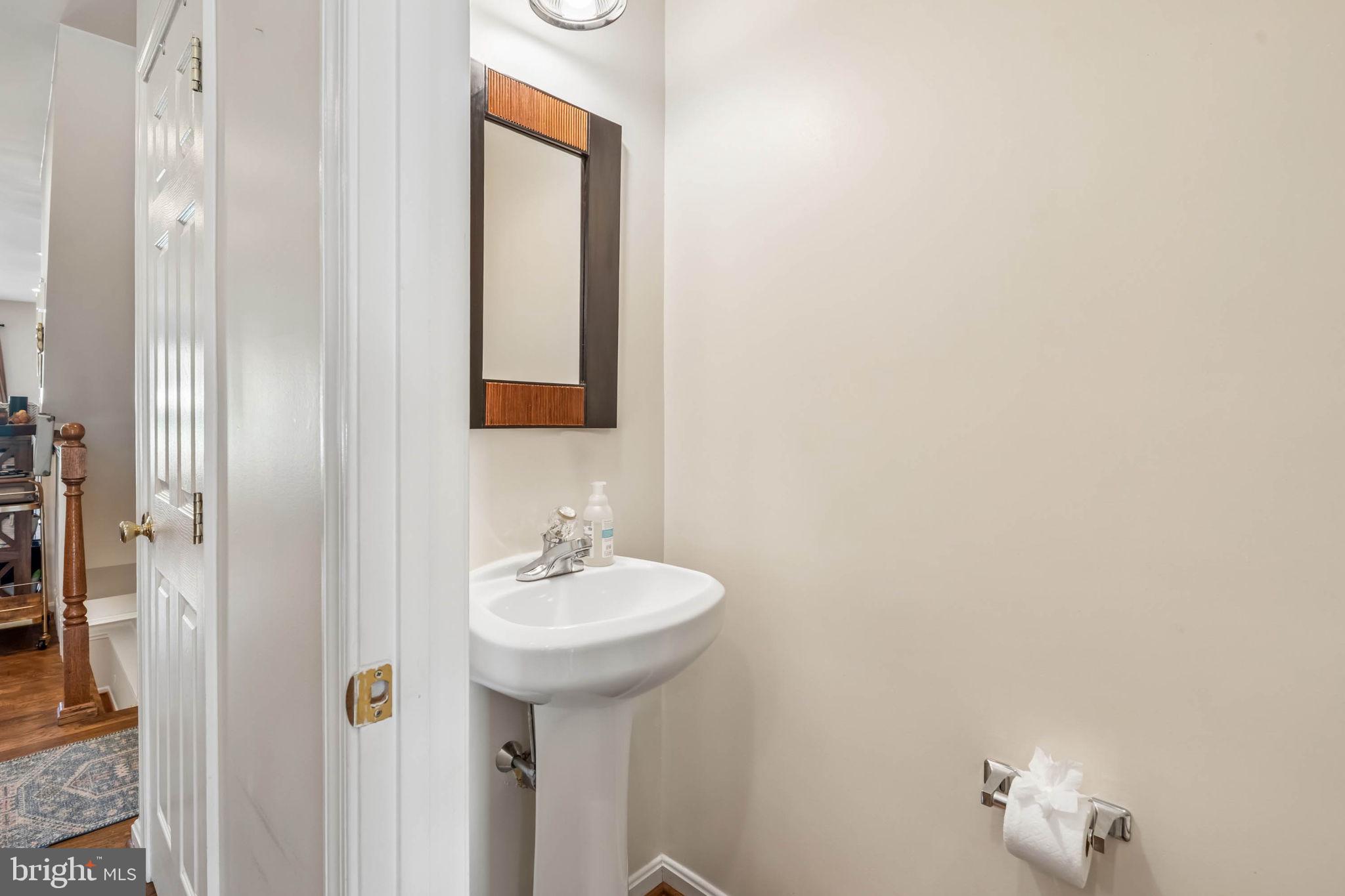 3005 Keswick Road Baltimore, MD 21211 - Photo 11 of 46 Main-level powder room