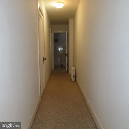 a room with window and mirror