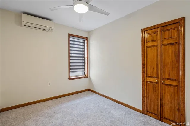 a view of an empty room with window