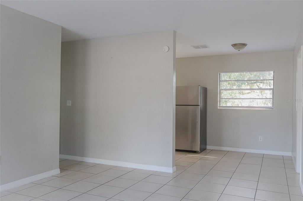 2708 Dixie Road Lakeland, FL 33801 - Photo 4 of 31 an empty room with windows and closet