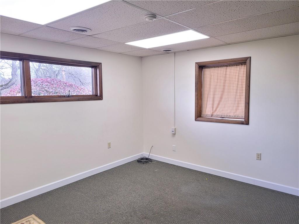 1235 South Center Street Extension, Unit B Grove City, PA 16127 - Photo 6 of 11 an empty room with a window