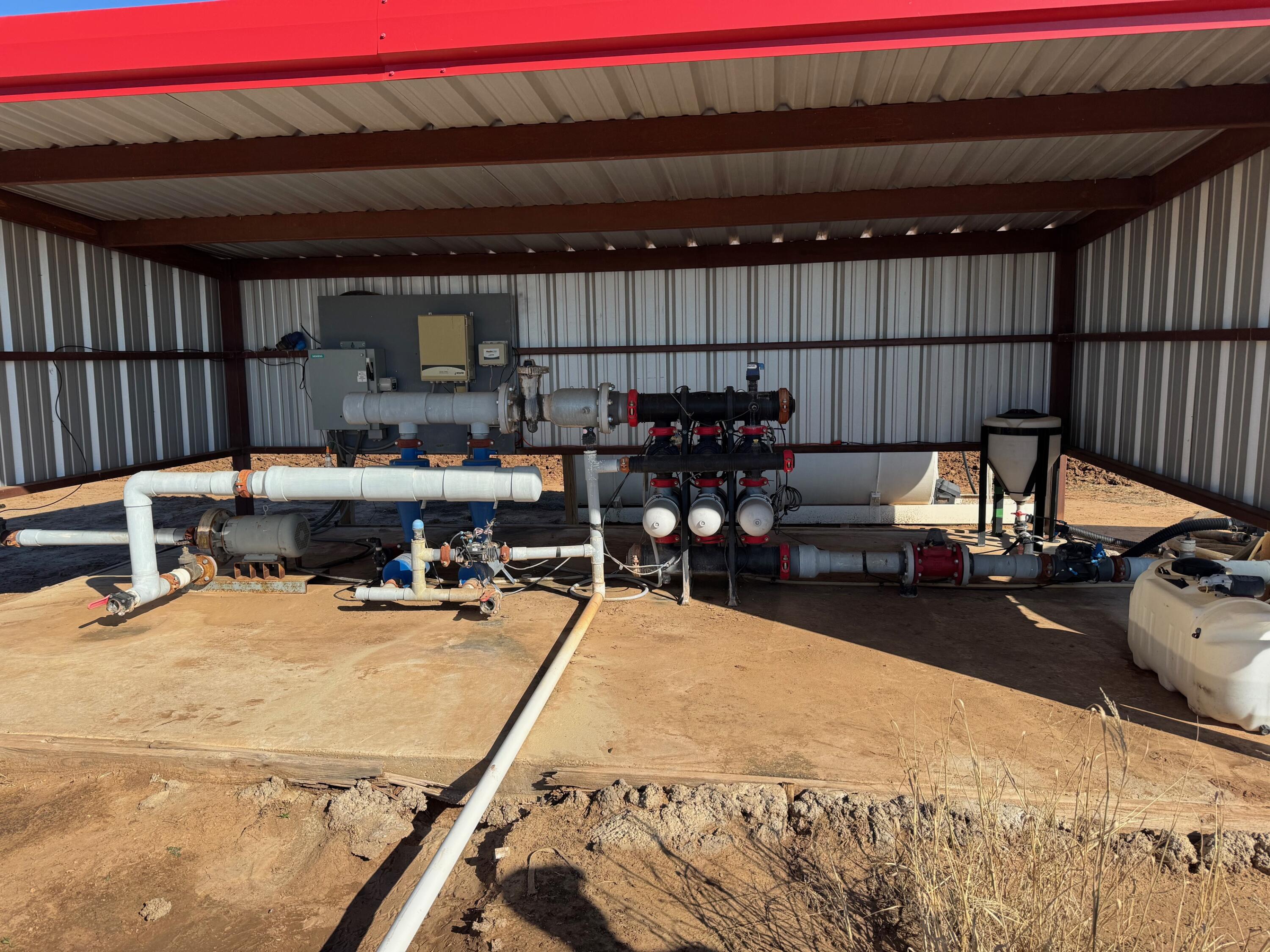 740 Sun Road Plainview, TX 79072 - Photo 5 of 15 a view of a swimming pool and furniture