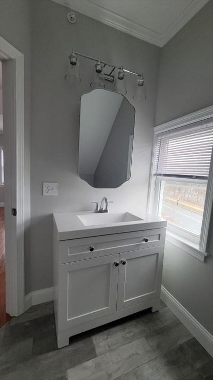 761 Highland Avenue, Unit 7 Fall River, MA 02720 - Photo 6 of 7 a bathroom with a sink and mirror