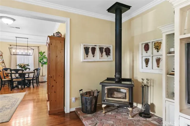 a living room with furniture and a book shelf