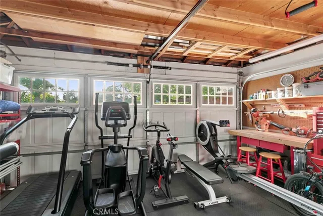 a view of a porch with furniture and yard