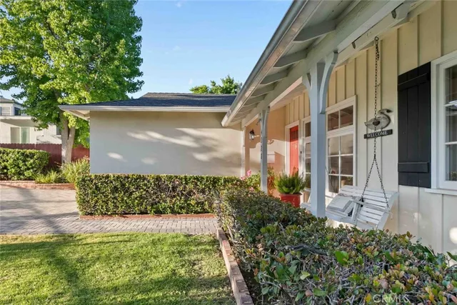 swimming pool view with a lake view