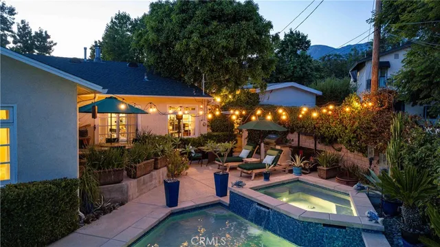 a view of a house with a street