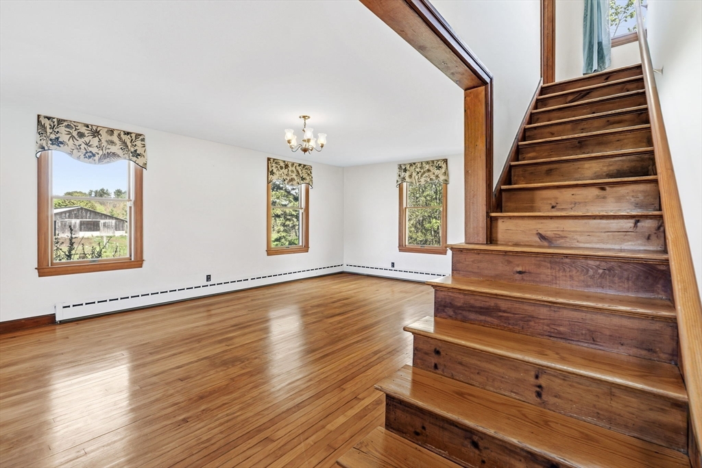 17 Moose Brook Road Southampton, MA 01073 - Photo 17 of 38 a view of an entryway with wooden floor and door
