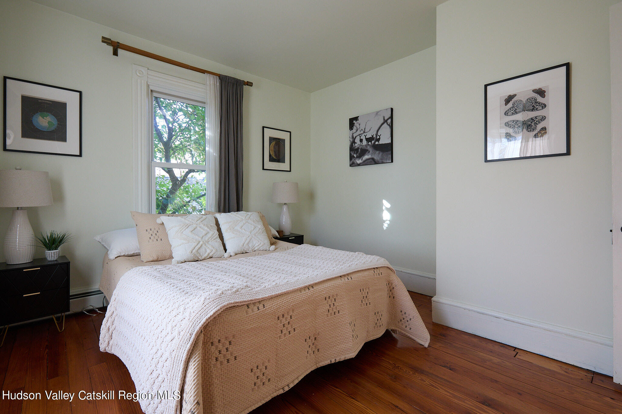 70 Store Road Accord, NY 12404 - Photo 24 of 43 a bedroom with a bed and a painting on the wall