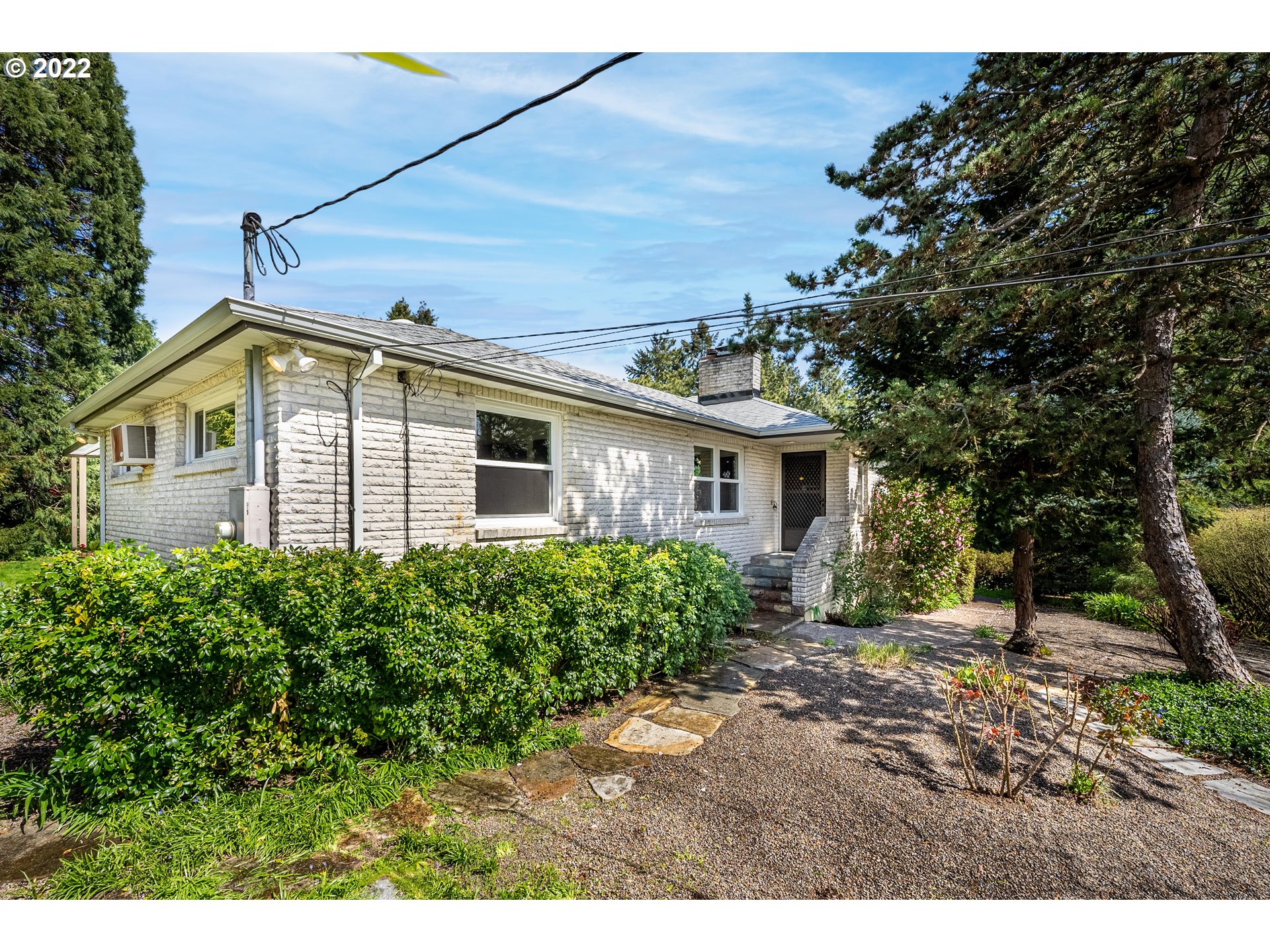 135 South Ridge Drive Portland, OR 97219 - Photo 1 of 32 a view of a house with a yard