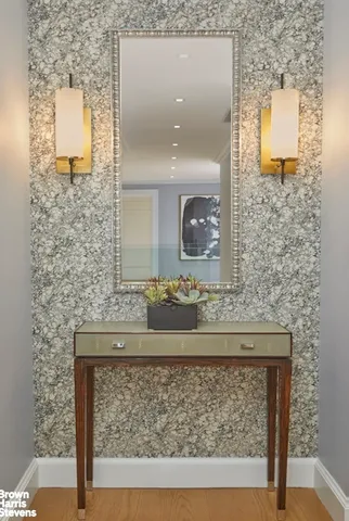 a view of an entryway with a workspace