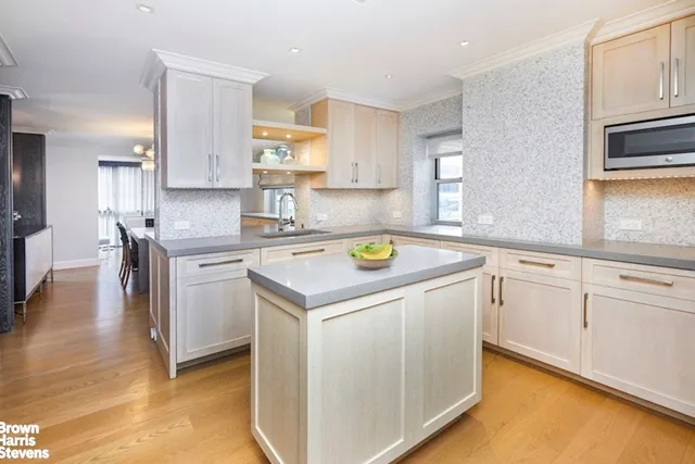 a view of a livingroom with furniture and a window