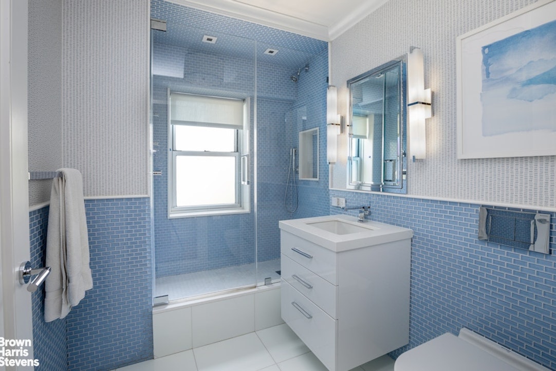 150 East 69th Street, Unit 4M Manhattan, NY 10021 - Photo 19 of 24 a bathroom with a sink toilet shower and bathtub