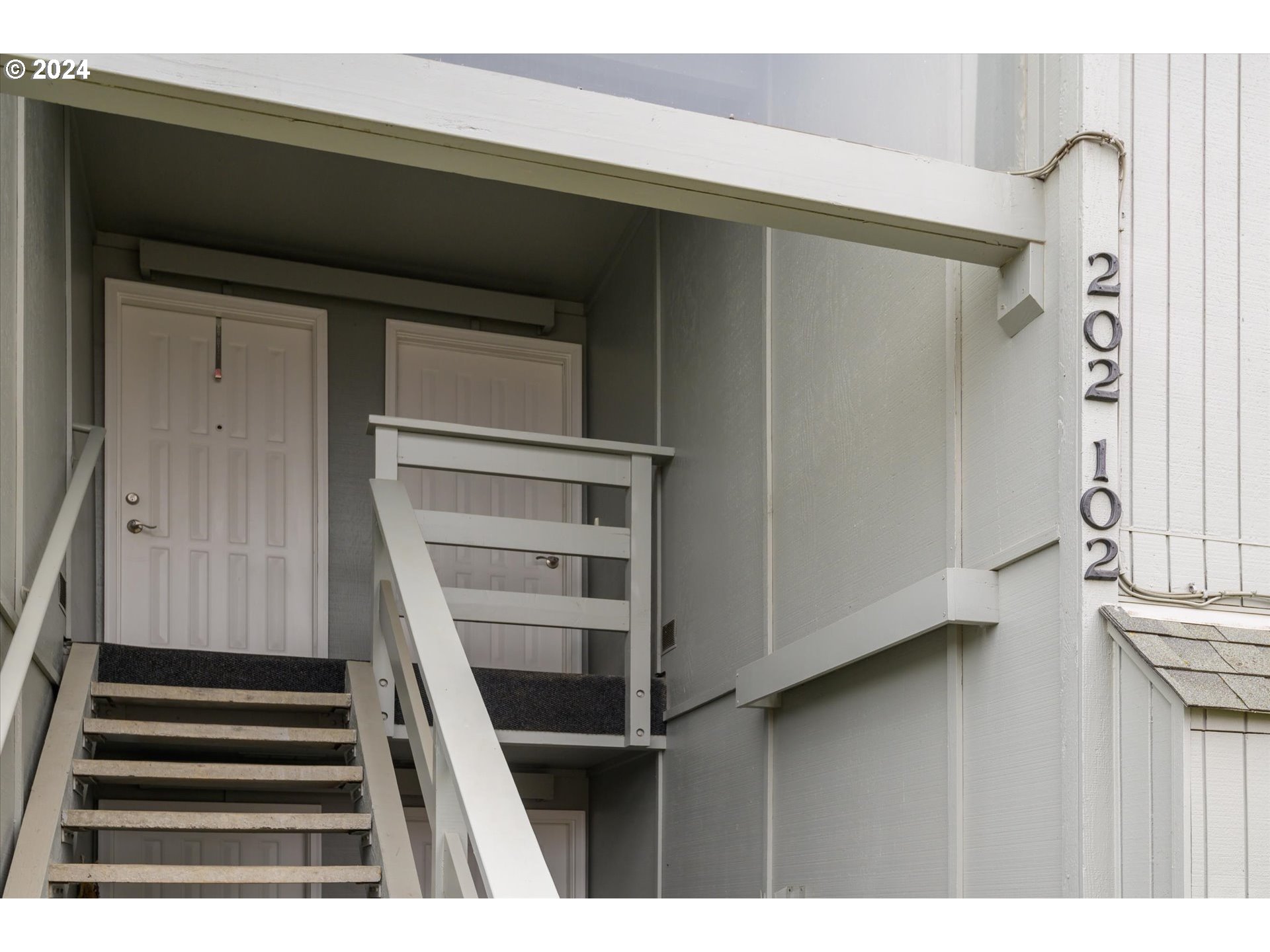 650 Harlow Road, Unit 202 Springfield, OR 97477 - Photo 2 of 34 a view of entryway with wooden floor