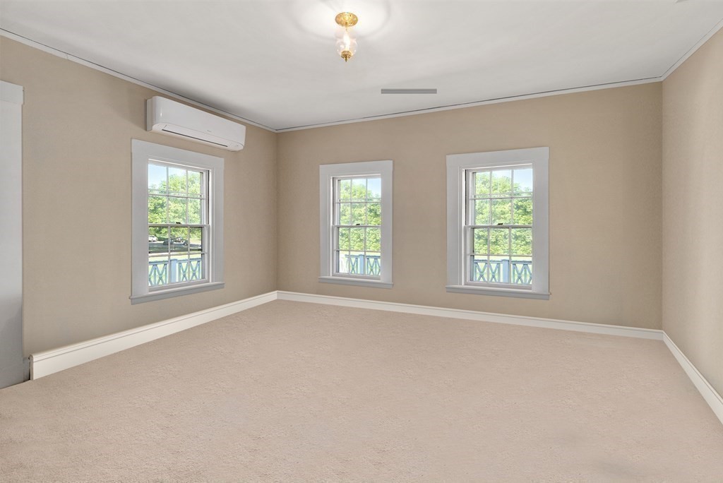 279 Meadowbrook Road Weston, MA 02493 - Photo 11 of 13 an empty room with windows