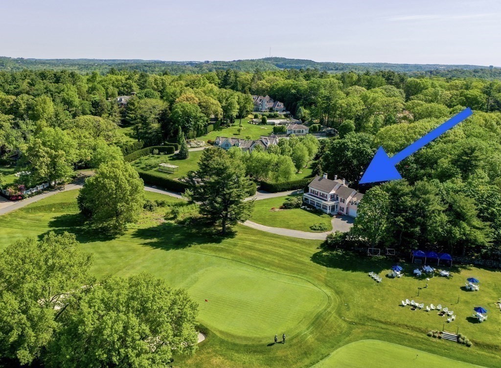 279 Meadowbrook Road Weston, MA 02493 - Photo 2 of 13 a view of a garden with a building in the background
