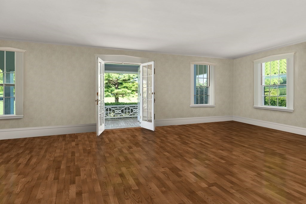 279 Meadowbrook Road Weston, MA 02493 - Photo 5 of 13 a view of an empty room with window and wooden floor