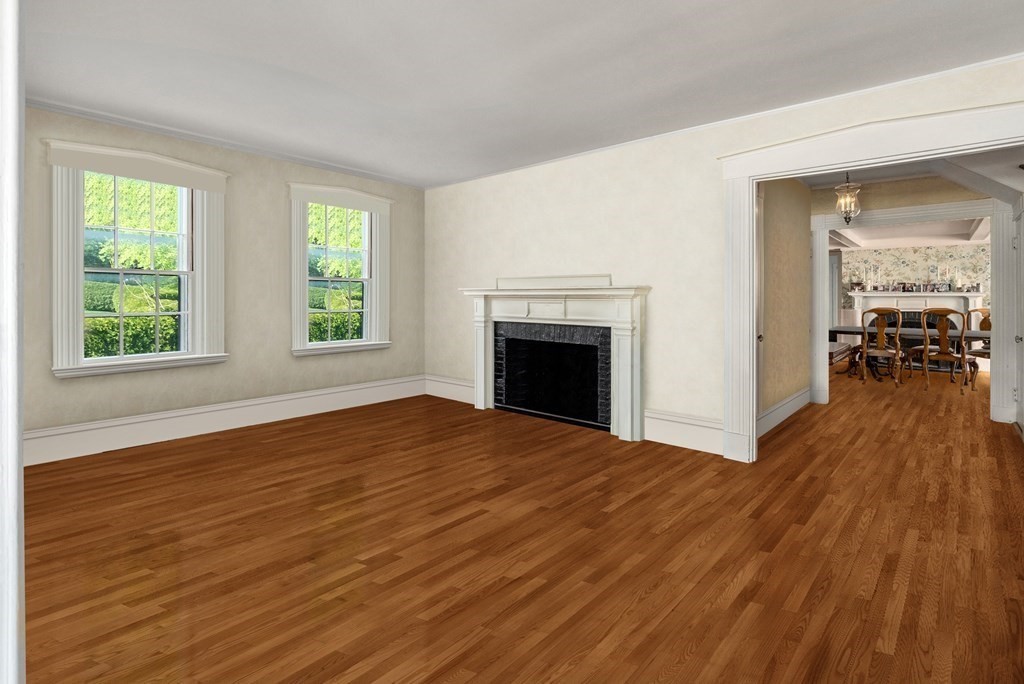 279 Meadowbrook Road Weston, MA 02493 - Photo 6 of 13 an empty room with wooden floor fireplace and windows