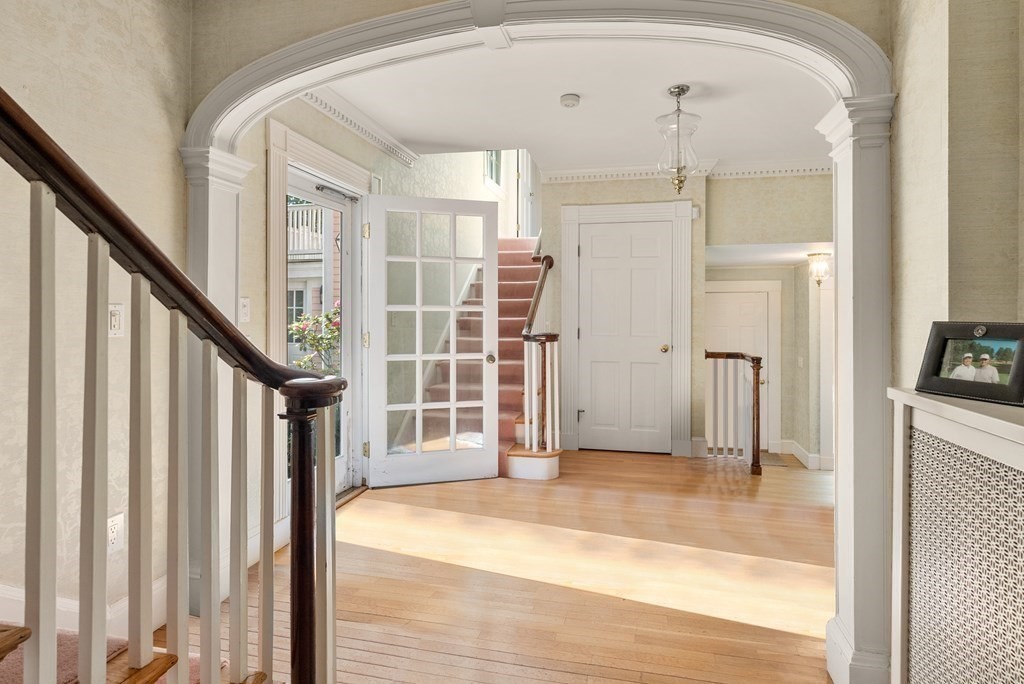 279 Meadowbrook Road Weston, MA 02493 - Photo 7 of 13 a view of entryway with wooden floor and livingroom view