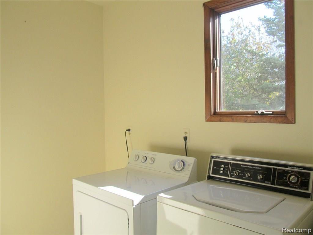 5260 Inverrary Lane Commerce Township, MI 48382 - Photo 18 of 24 First Floor Laundry