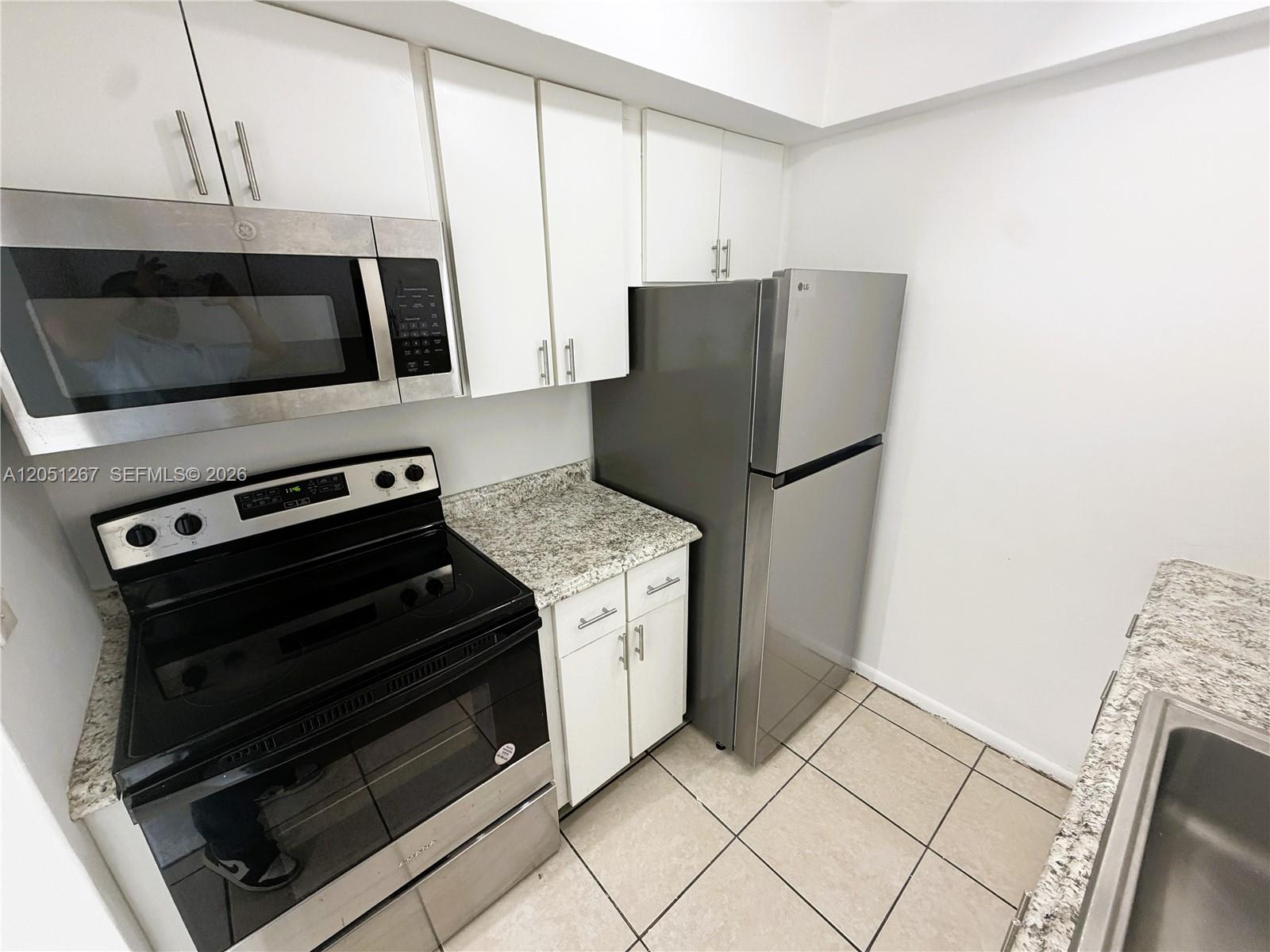 7340 Southwest 82nd Street, Unit C205 Miami, FL 33143 - Photo 1 of 18