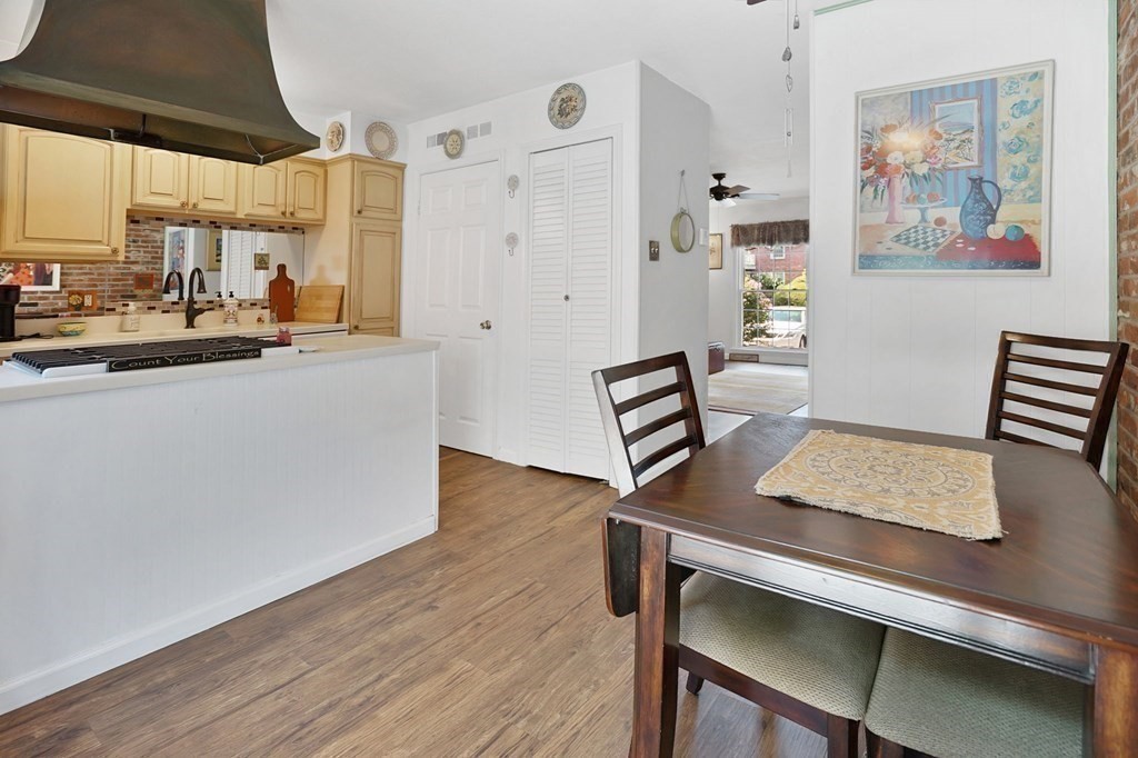 146 Jamestown Drive, Unit 146 Springfield, MA 01108 - Photo 16 of 26 a view of kitchen with furniture and wooden floor