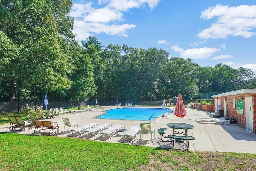146 Jamestown Drive, Unit 146 Springfield, MA 01108 - Photo 25 of 26 a view of a backyard with sitting area