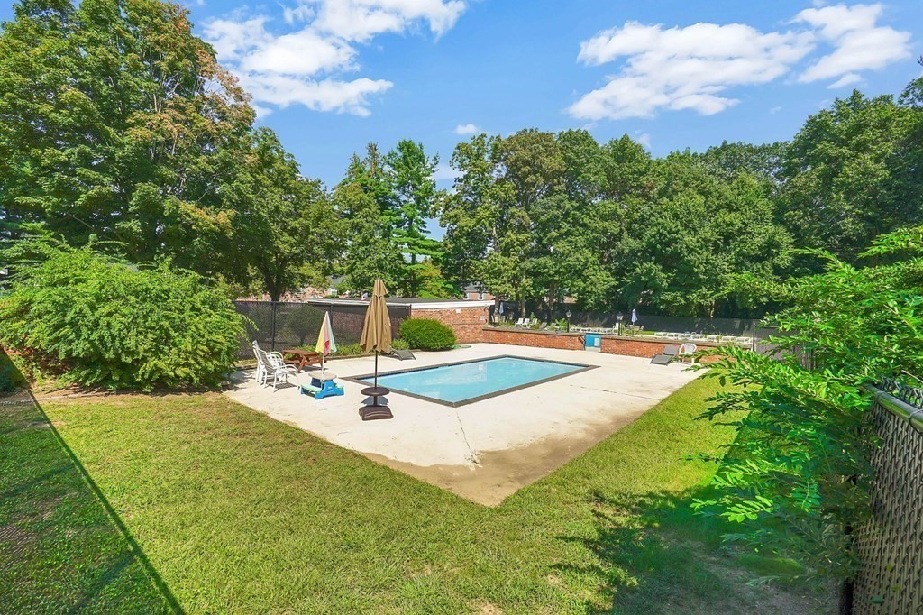 146 Jamestown Drive, Unit 146 Springfield, MA 01108 - Photo 26 of 26 a view of a backyard with swimming pool