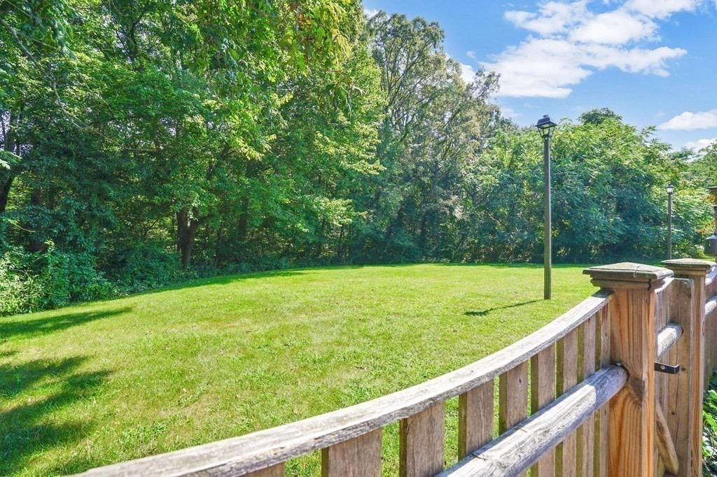 146 Jamestown Drive, Unit 146 Springfield, MA 01108 - Photo 4 of 26 a view of an outdoor space and a yard