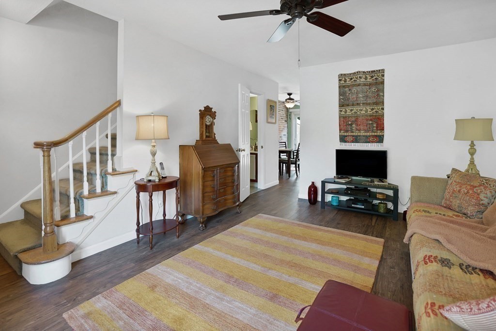 146 Jamestown Drive, Unit 146 Springfield, MA 01108 - Photo 6 of 26 a bedroom with furniture and a flat screen tv