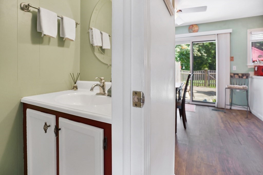 146 Jamestown Drive, Unit 146 Springfield, MA 01108 - Photo 10 of 26 a bathroom with a sink a toilet and a mirror