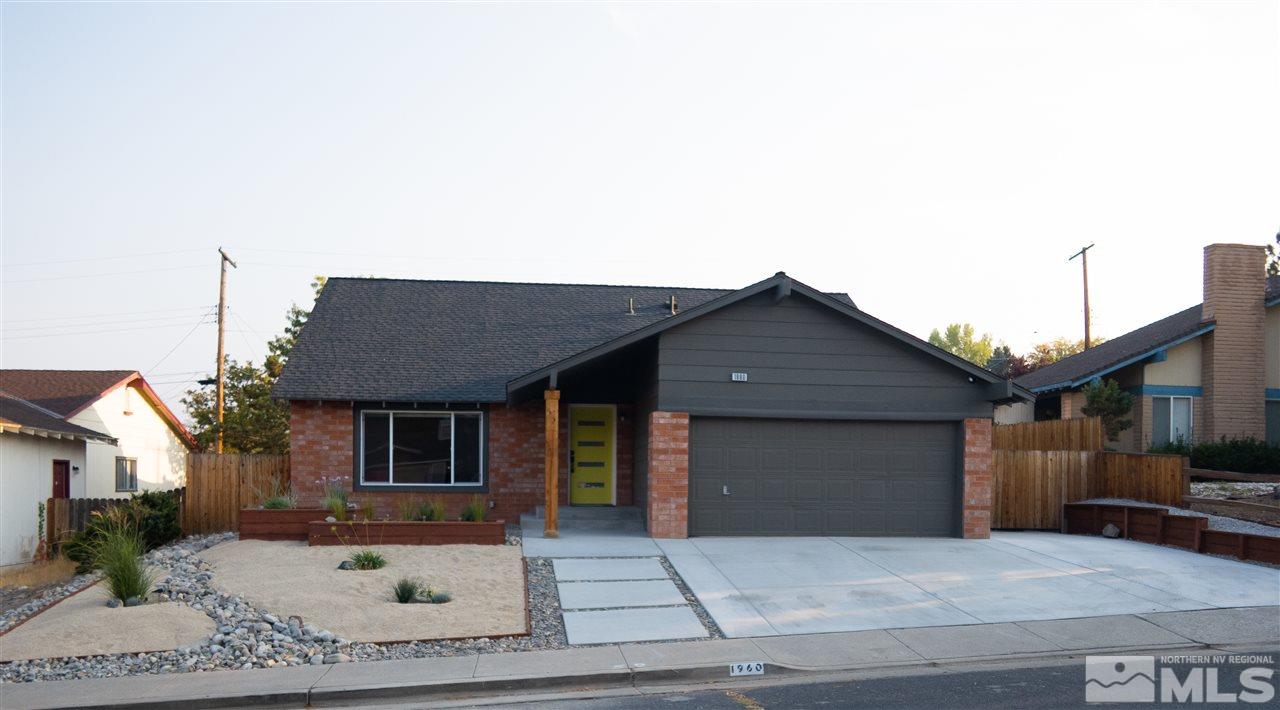 1960 Kings Row Reno, NV 89503 - Photo 2 of 16 a front view of a house with yard