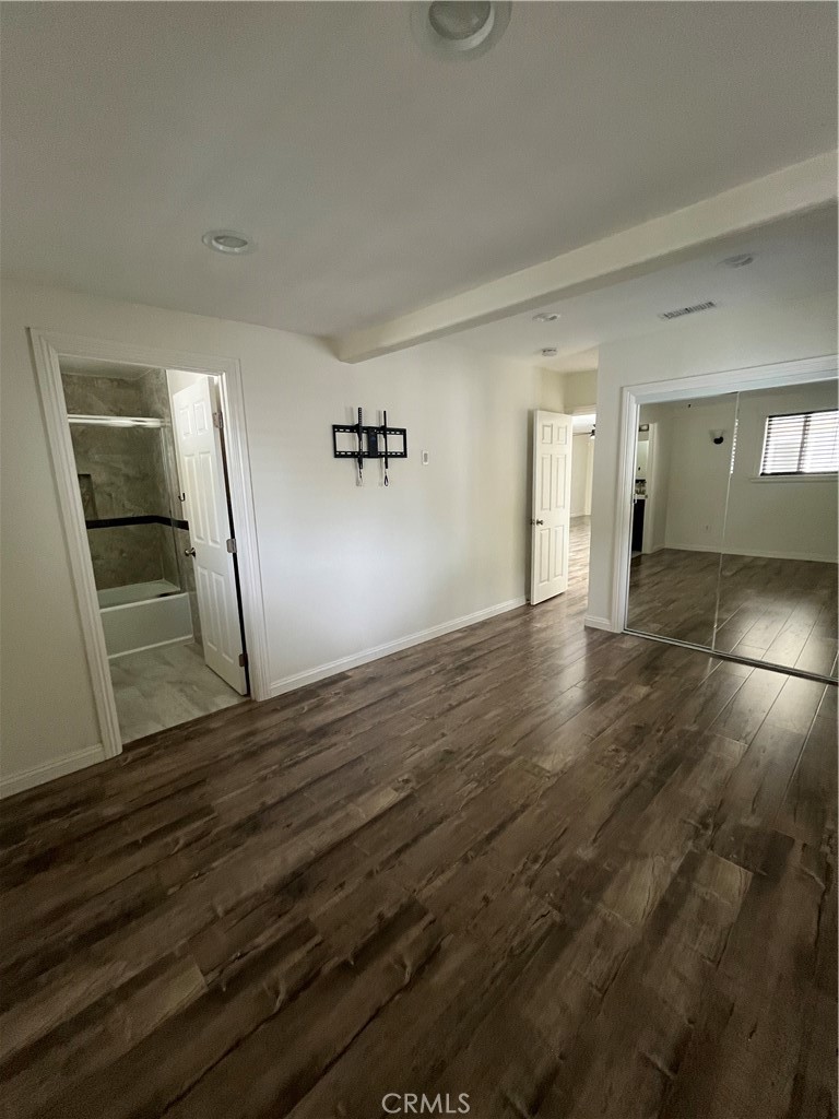 3751 Briscoe Street Riverside, CA 92506 - Photo 15 of 16 a view of empty room with wooden floor