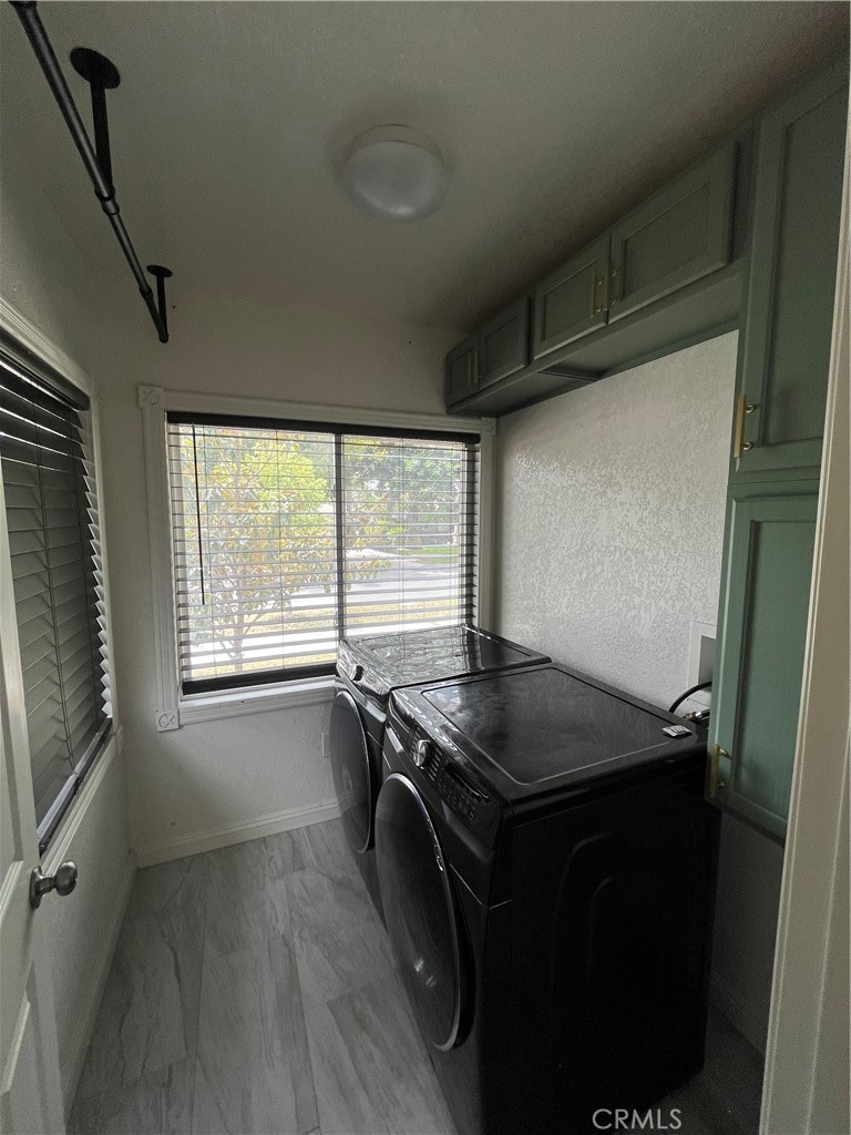 3751 Briscoe Street Riverside, CA 92506 - Photo 9 of 16 a kitchen with a stove a sink and a refrigerator