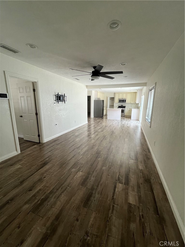 3751 Briscoe Street Riverside, CA 92506 - Photo 10 of 16 a view of a livingroom with wooden floor
