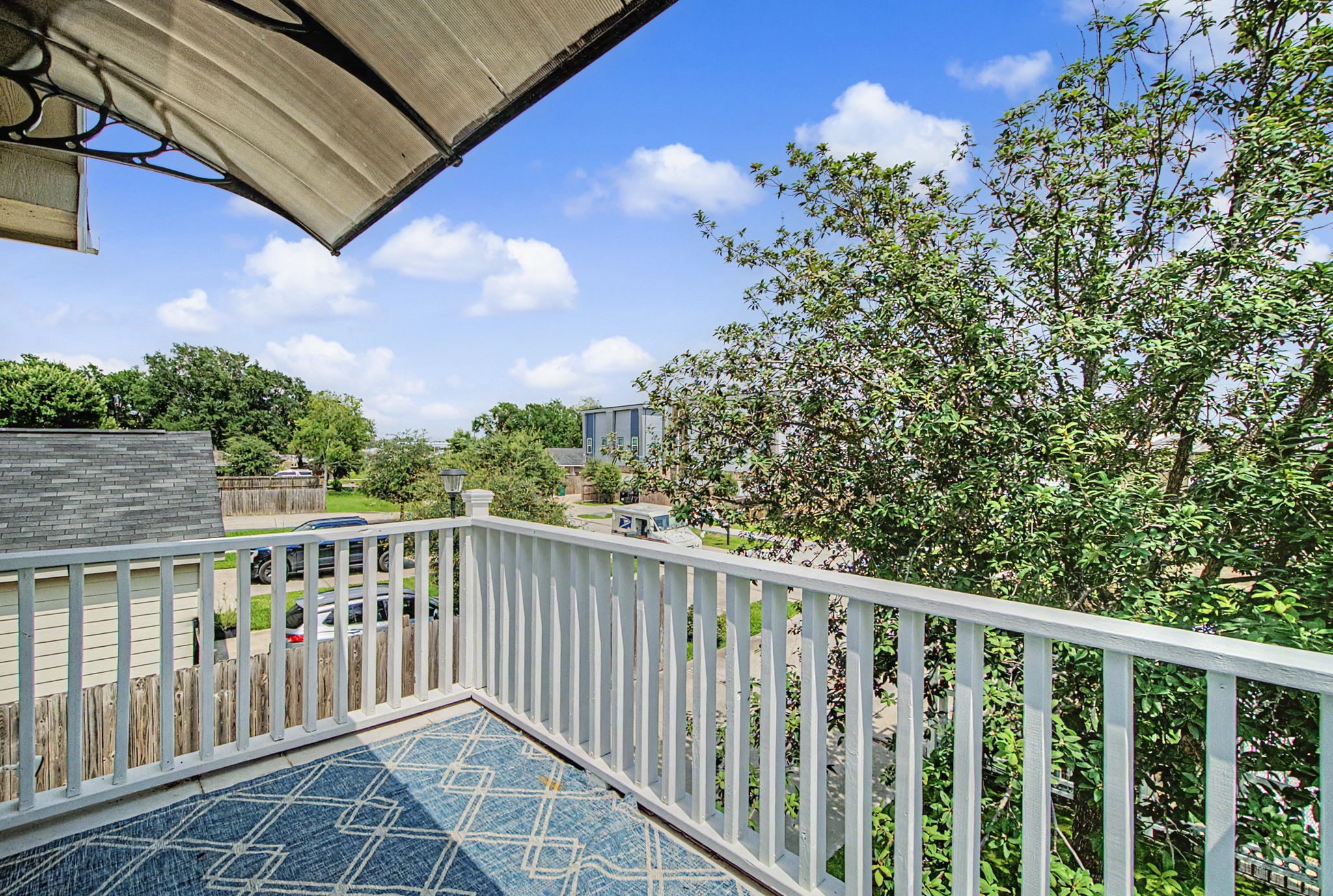 10034 Alfred Lane Houston, TX 77041 - Photo 38 of 50 Enjoy fresh air, morning coffee, and peaceful neighborhood views from this private balcony.