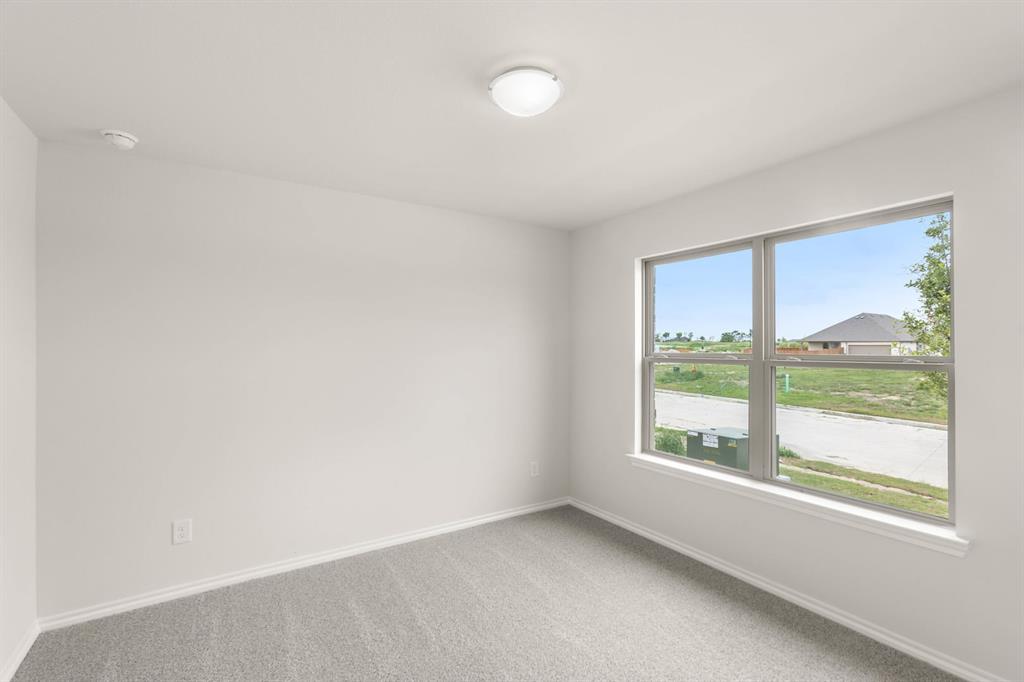 2841 Hay Lane Midlothian, TX 76065 - Photo 16 of 27 an empty room with windows