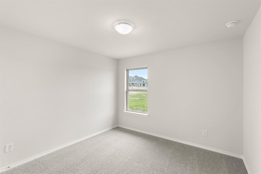 2841 Hay Lane Midlothian, TX 76065 - Photo 17 of 27 an empty room with windows
