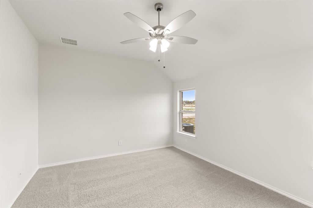 2841 Hay Lane Midlothian, TX 76065 - Photo 19 of 27 an empty room with a window and a fan