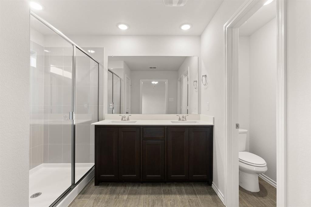 2841 Hay Lane Midlothian, TX 76065 - Photo 21 of 27 a bathroom with a sink a toilet and shower