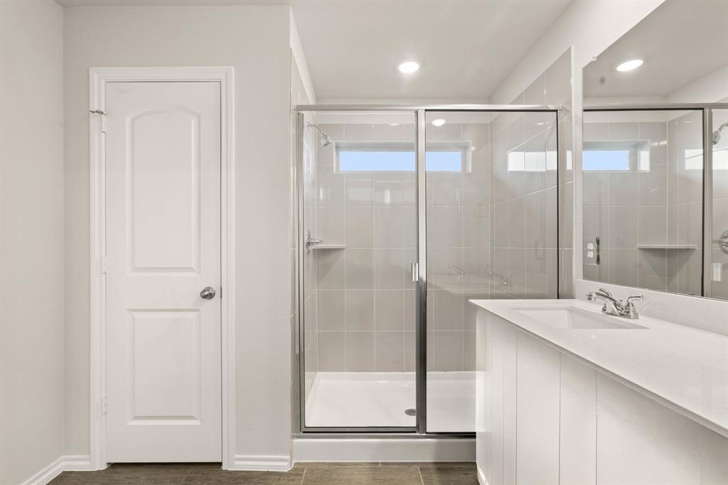 2841 Hay Lane Midlothian, TX 76065 - Photo 22 of 27 a bathroom with a shower and a sink