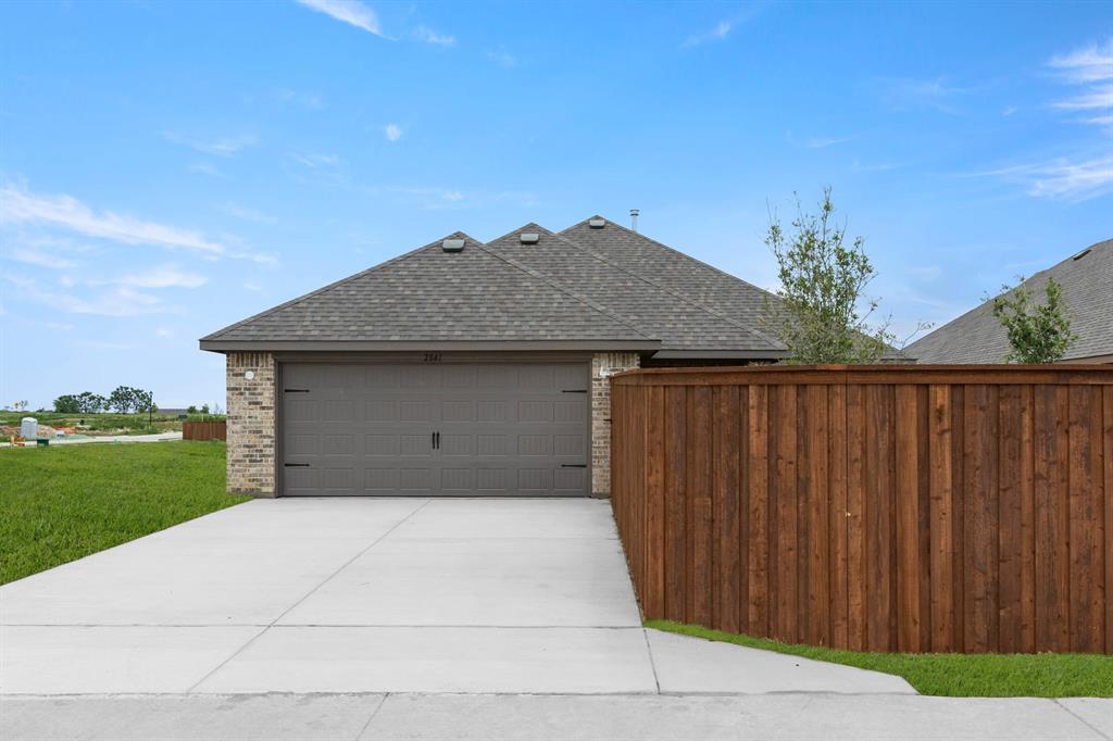 2841 Hay Lane Midlothian, TX 76065 - Photo 26 of 27 a front view of a house with a yard