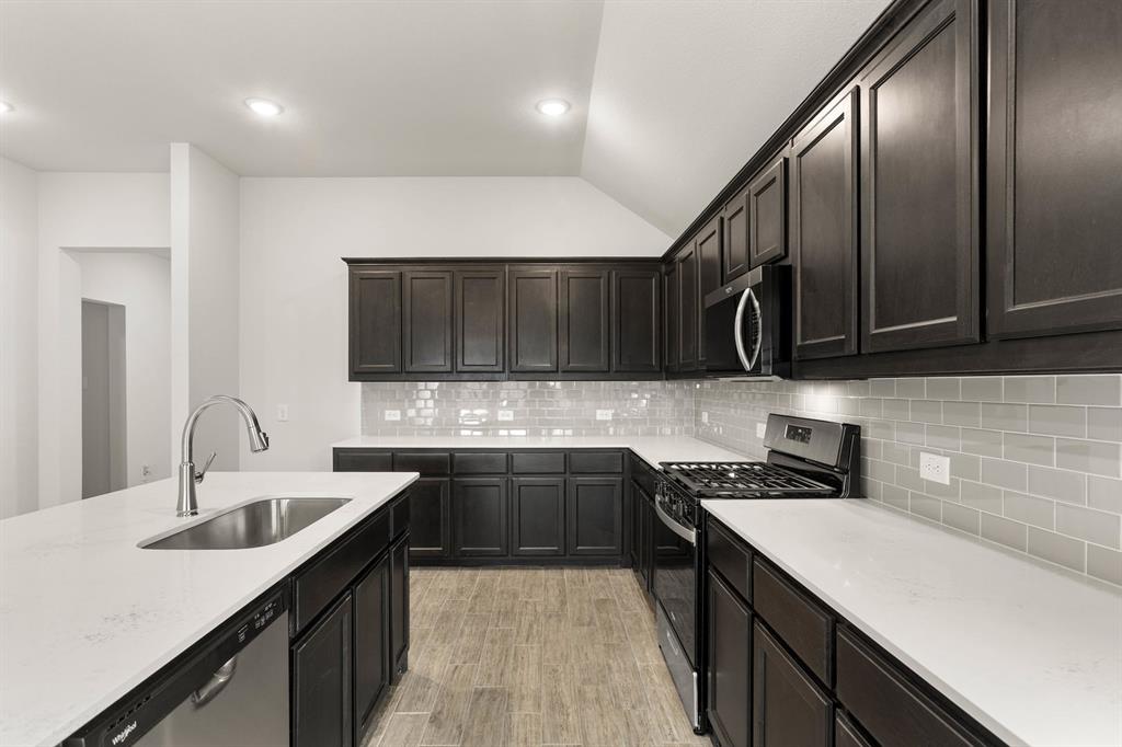 2841 Hay Lane Midlothian, TX 76065 - Photo 8 of 27 a kitchen with a sink and cabinets