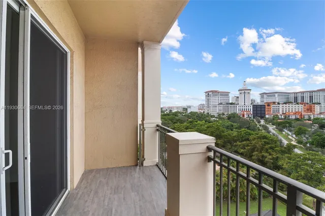 a view of a balcony with city view